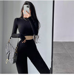 Prettyswomen Alias Solid Color Ribbed Slim Long Sleeve Cropped Top High Waist Pants Matching Set