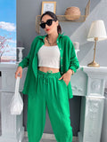 Prettyswomen 2022 spring and summer new European and American casual suits solid color lapel long-sleeved shirt top harem pants two-piece set